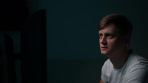 Young Adult Watching Stock Market Data Celebrate Success