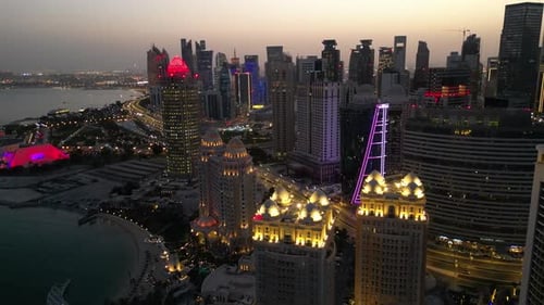 Skyscrapers at night in West Bay area of Doha (Ad-Dauha), capital of Qatar