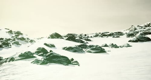 Realistic Winter Landscape with Snow-Covered Mountains and Rocks