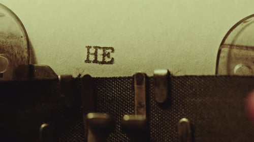 Typing Help Me Phrase on Paper with Analog Typewriter
