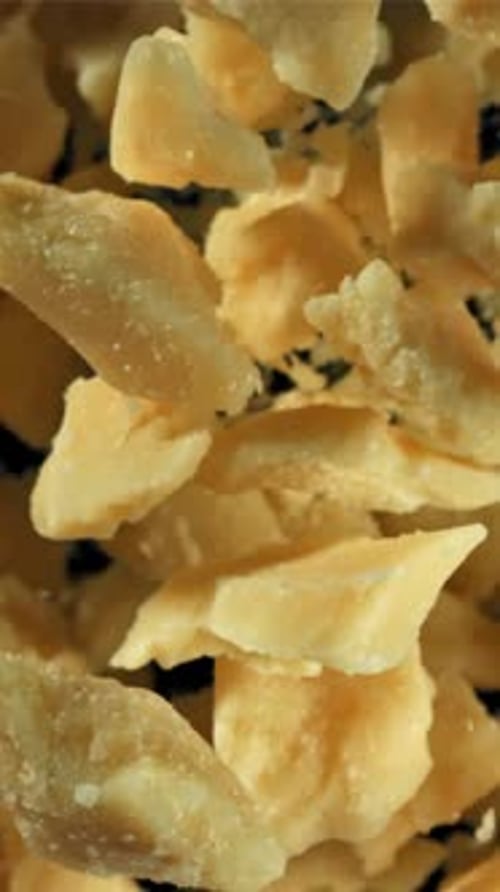 Parmesan Cheese Flies Up and Falls Down Filmed on a Highspeed Camera at 1000 Fps