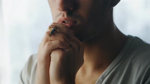 Close Up of Young Man Praying to God