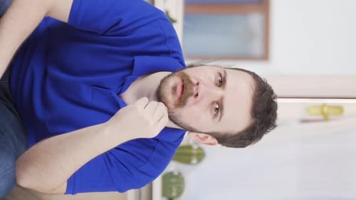 Man With Beard Indoors Looking at Camera