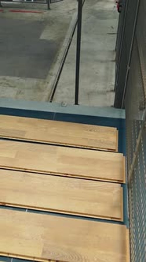 Wooden Planks on a Conveyor Belt