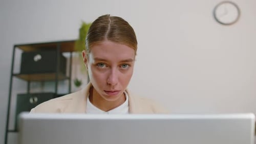 Businesswoman Girl Freelancer at Office Workplace Working on Laptop Computer Sends Online Messages