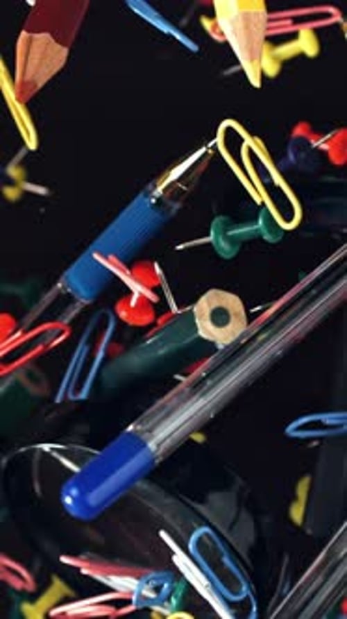 Different School Tools Fly Up and Down Back to School Filmed on a Highspeed Camera at 1000 Fps