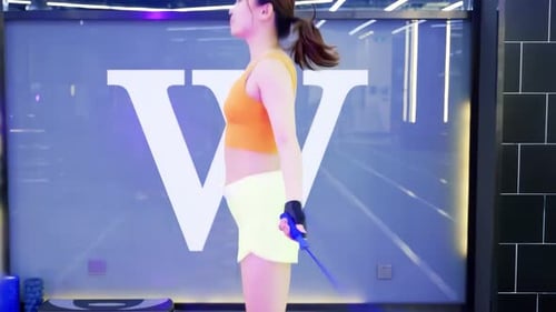 Girl in sport gym, bodybuilding equipment, skipping exercise training, skipping jump rope for cardio