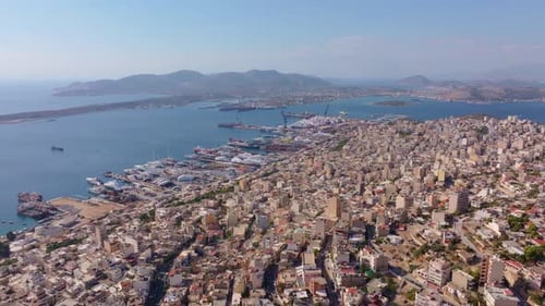 Aerial view of cityscape and harbor, Greece.