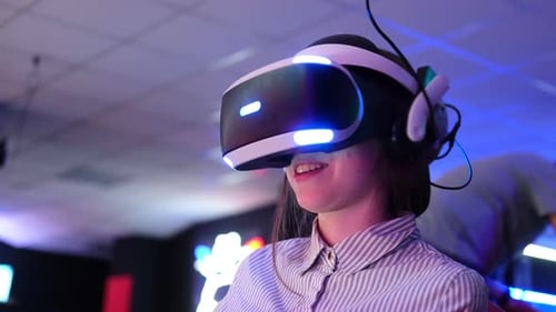 Young Woman Using Virtual Reality Headset