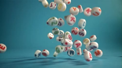 Falling Letters on a Blue Background Filmed on a Highspeed Camera at 1000 Fps
