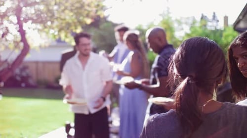Friends and Family Gathering for Backyard Barbecue