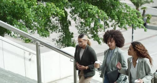 4k video footage of three business woman walking out of the office