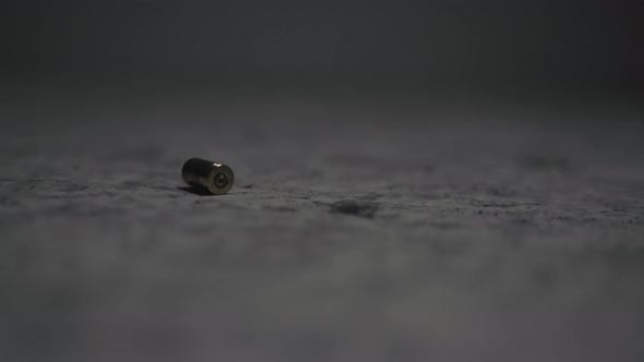 9mm Handgun shells falling to the floor in slow motion (120fps ...
