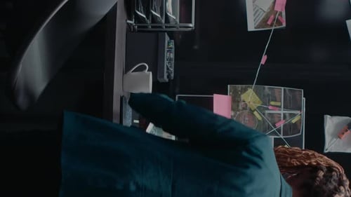 Person Studying Evidence on a Board