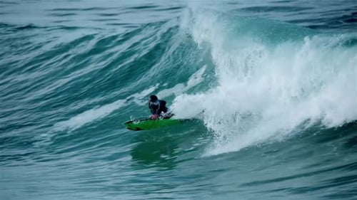 Body boarder surfing a wave