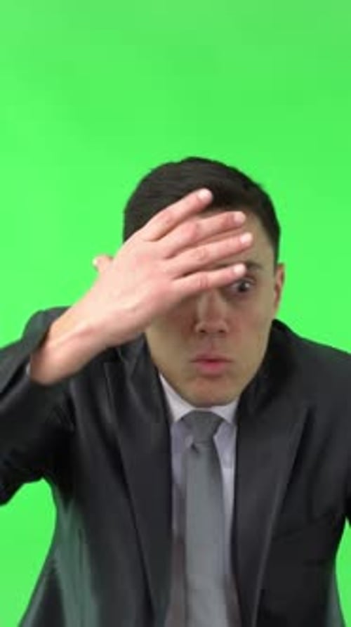 Man Reacting with Surprise, Despair, and Physical Pain