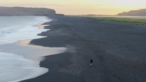 Black Sand Beach, Distant Mountains at Golden Hour