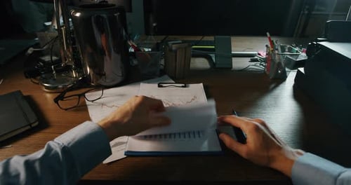 POV of businessman is signing a project to confirm an approval for it's future realization. Concep