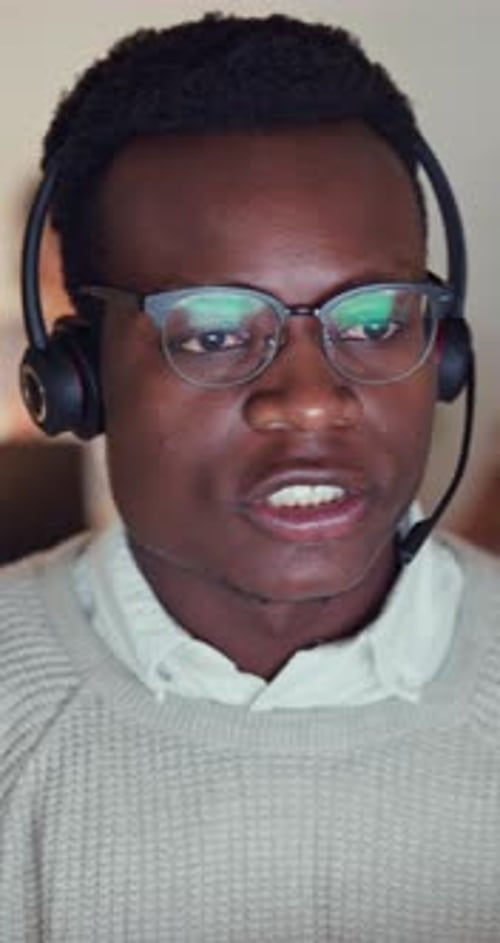 Black man, call center and glasses for helping in office, night shift and telemarketing agent