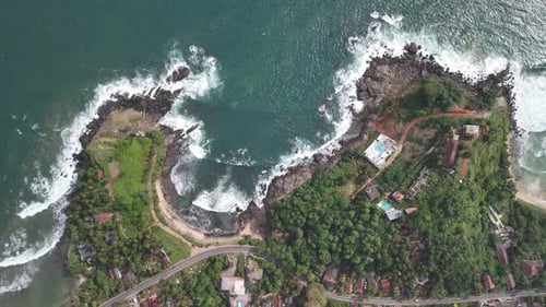 Sri Lanka Indian ocean rocky limestone coastline, aerial drone top down view