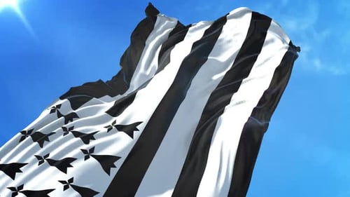 Realistic Brittany Flag Waving in Wind against Blue Sky