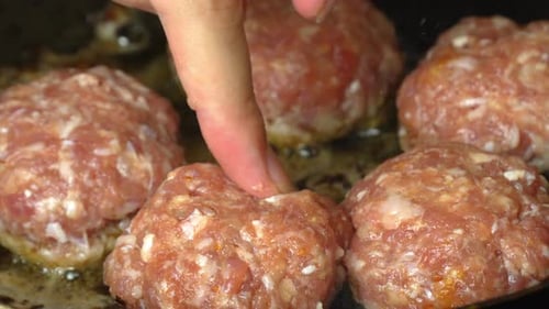 Raw Meatballs Cooking Preparation in Pan Close Up