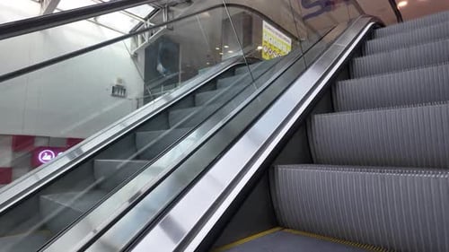 Up and Down: A Day at the Escalator-Lined Mall
