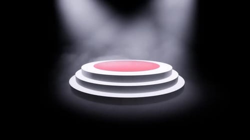 Dramatic spotlight on modern circular stage with red center