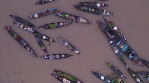 Aerial view of floating market with boats, Indonesia.