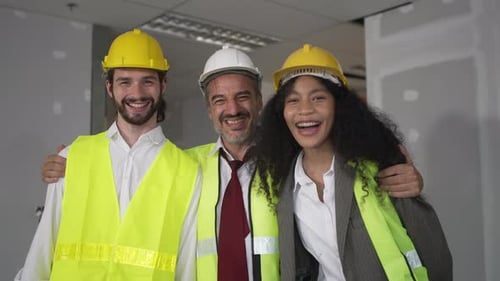 Constructors work at High rise building site.