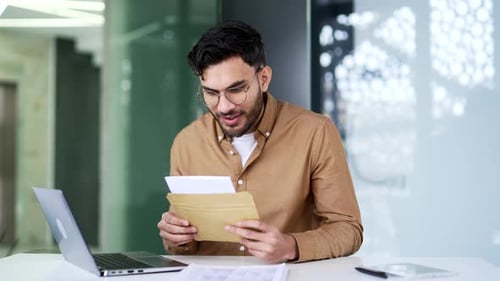 Man Receives Good News in Office