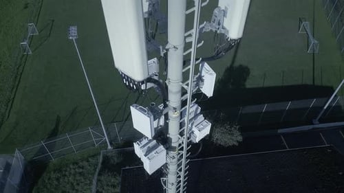 A Stunning Aerial View Showcasing a Modern Telecommunication Tower in a Vibrant Cityscape