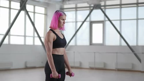 Closeup Shot of a Sporty Girl Building Muscles and Develop Totalbody Strength