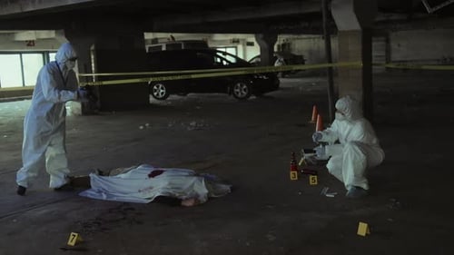 Two Forensic Experts Investigating Murder in Urban Parking Lot