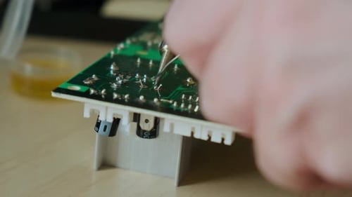Soldering Small Components on a Green Circuit Board
