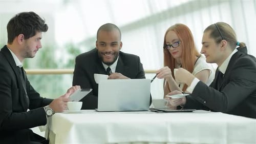 Business Team Working Together at Table