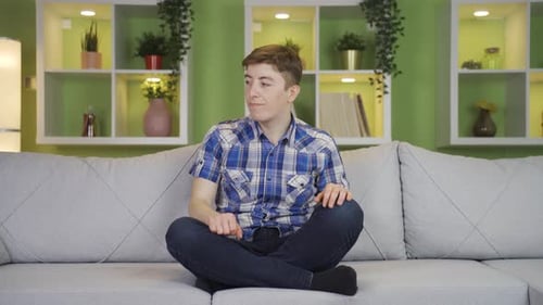 Young man is stressed and nervous at home.