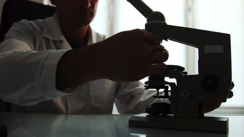 Microscope Examination in a Medical Research Laboratory