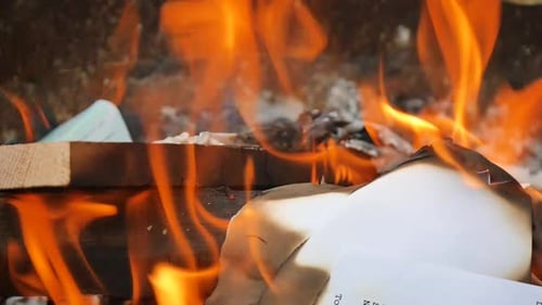 Paper burning in a fire