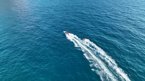 Sports Boat Sails Fast on the Sea Aerial View 4 K