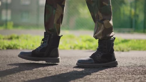 Steady Soldier In Camouflage Completes Determined Training Walk Disciplined Soldier Advances Along