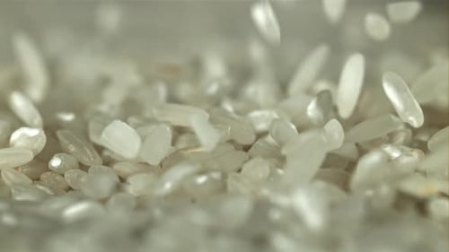 Rice Falls on the Table Filmed on a Highspeed Camera at 1000 Fps