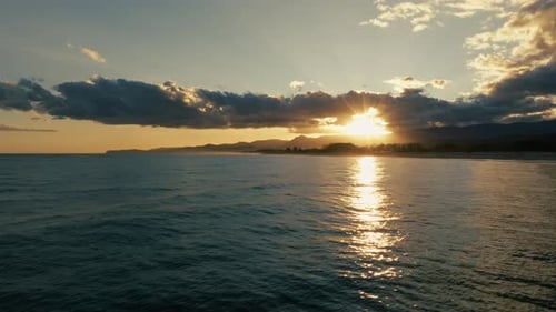 Sunset With Religious Sky And Empty Flat Ocean In Winter