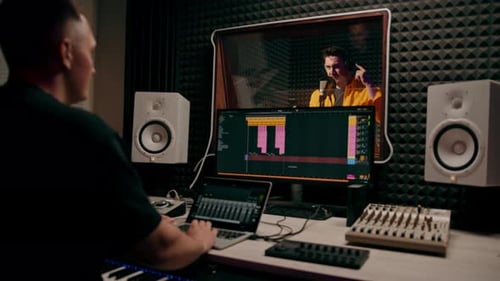 young pop rap artist emotionally recording a new song in a professional recording studio sound