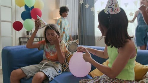 Children Celebrate Birthday Party with Balloons