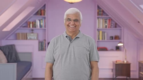 Happy Indian old man smiling