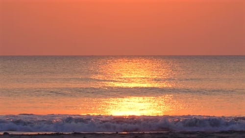 Serene Sunset Landscape Over Calm Ocean Waves Vibrant Orange and