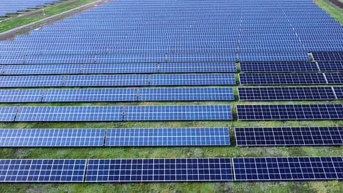 Vast Solar Panel Farm Aerial View