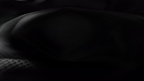 Dark Carbon Fiber Texture Moving in a Slow and Relaxing Wave Motion Seamless Looping Animation of a