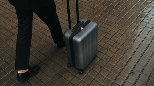 Tourist Man with Suitcase Baggage in Spain A Traveler with Luggage Suit Jacket on Business Street Go